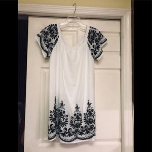 White dress with beautiful black embroidery